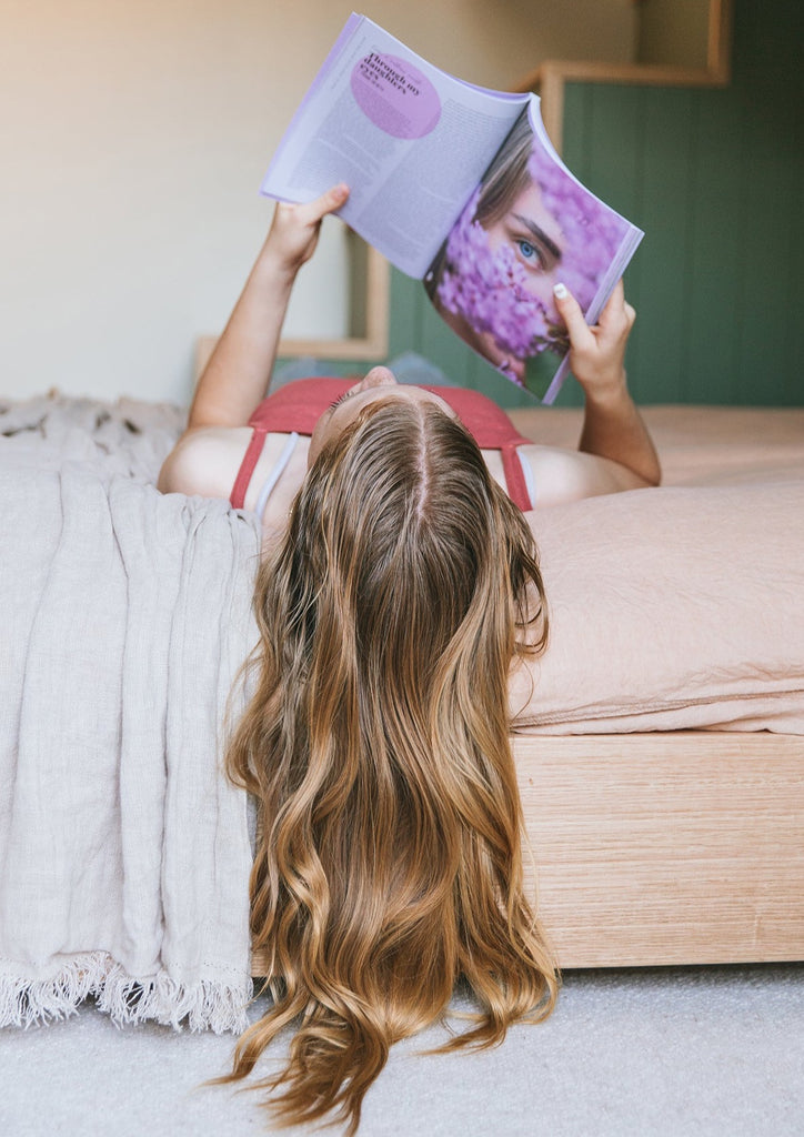 teen girl with gorgeous long locks lying on bed reading Pippin Girl Bloom part 03 go with the flow